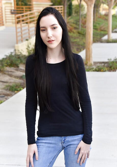 Slender russian dark hair teen Maia in jeans reveals tiny tits and spreads her legs outdoor